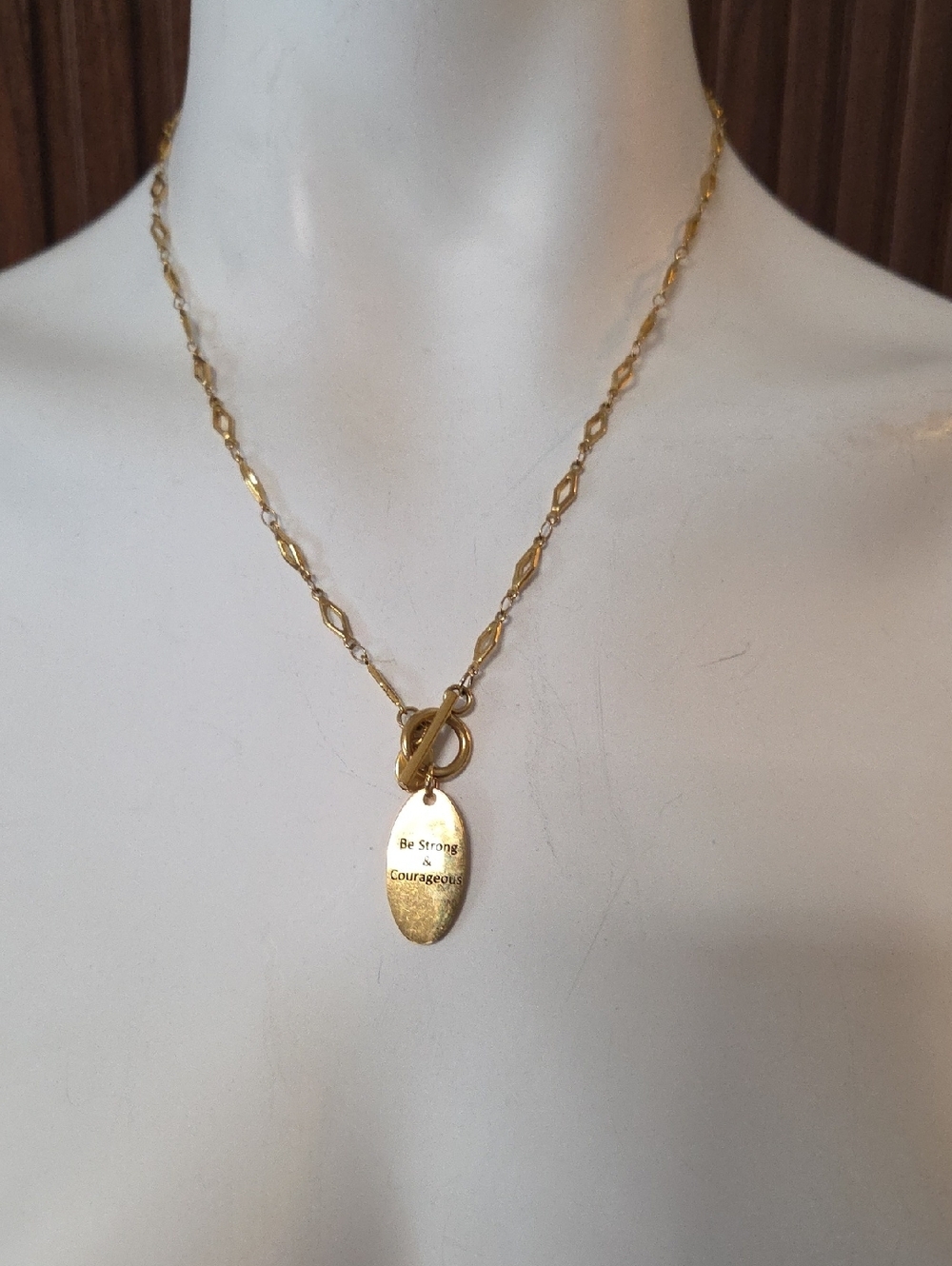 Plunder Gold Tone Oval Pendant Toggle Necklace - Be Strong Courageous
